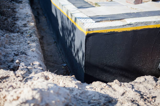 Professional Waterproofing technician working in Medina, MN